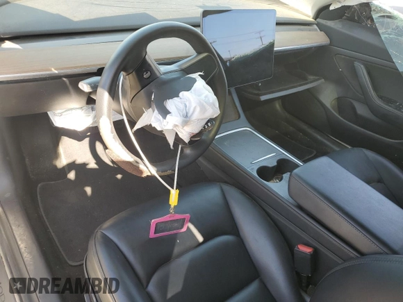 2021 Tesla Model 3 Standard Range Plus with VIN 5YJ3E1EA8MF874156, listed as a Copart auction lot 46323505 with Not Provided miles and Salvage Title. Bid and sale history available at DreamBid. Image 8.