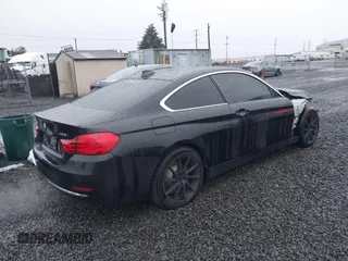 2015 BMW 4 Series 428i xDrive with VIN WBA3N5C56FK197981, listed as a IAAI auction lot 41145927 with 101,944 mi miles and . Bid and sale history available at DreamBid. Image 4.