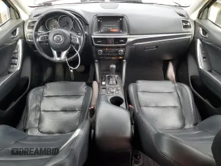 2016 Mazda CX-5 Grand Touring with VIN JM3KE2DY4G0795271, listed as a Copart auction lot 50986845 with 92,323 mi miles and Salvage Title. Bid and sale history available at carsss.com. Image 8.