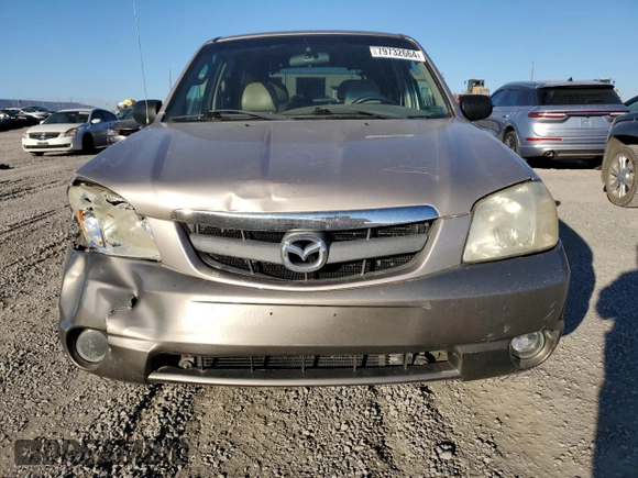 2002 Mazda Tribute LX with VIN 4F2YU09182KM36685, listed as a Copart auction lot 79732664 with 204,262 mi miles and Salvage Title. Bid and sale history available at carsss.com. Image 5.