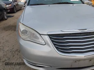 2012 Chrysler 200 LX with VIN 1C3CCBAB4CN100534, listed as a IAAI auction lot 41717885 with 217,921 mi miles. Bid and sale history available at carsss.com. Image 12.