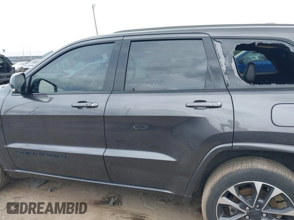 2021 Jeep Grand Cherokee 80th Anniversary with VIN 1C4RJFBG8MC728364, listed as a IAAI auction lot 39803814 with 34,000 mi miles and . Bid and sale history available at DreamBid. Image 14.