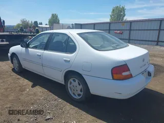 1999 Nissan Altima XE with VIN 1N4DL01D9XC104530, listed as a IAAI auction lot 42141246 with 168,803 mi miles. Bid and sale history available at carsss.com. Image 3.