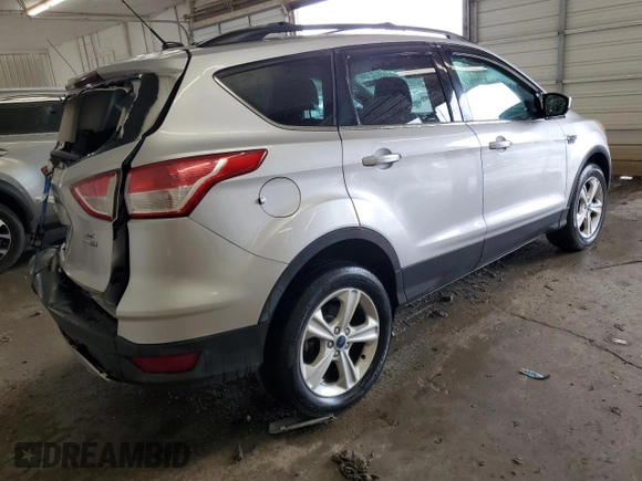 2013 Ford Escape SE with VIN 1FMCU9GX3DUD32274, listed as a Copart auction lot 63778235 with 161,288 mi miles and Salvage title. Bid and sale history available at DreamBid. Image 3.