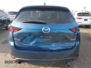 2021 Mazda CX-5 Touring with VIN JM3KFACM5M0332718, listed as a IAAI auction lot 41905933 with 30,930 mi miles. Bid and sale history available at carsss.com. Image 17.