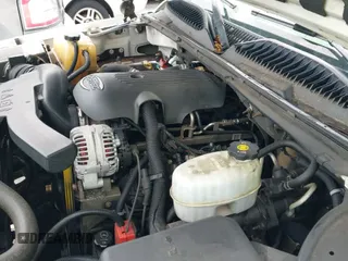 2005 Chevrolet Suburban Z71 z VIN 3GNFK16ZX5G191601, wystawiony jako IAAI lot #42727237 z przebiegiem 294 814 mil mil oraz . Historia ofert i sprzedaży dostępna na DreamBid. Obrazek 12.