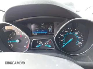 2016 Ford Escape Titanium with VIN 1FMCU9JX3GUA62802, listed as a IAAI auction lot 42001690 with 124,452 mi miles. Bid and sale history available at carsss.com. Image 7.