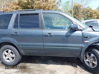 2006 Honda Pilot EX with VIN 2HKYF18416H529290, listed as a IAAI auction lot 41915915 with 135,385 mi miles and . Bid and sale history available at DreamBid. Image 13.