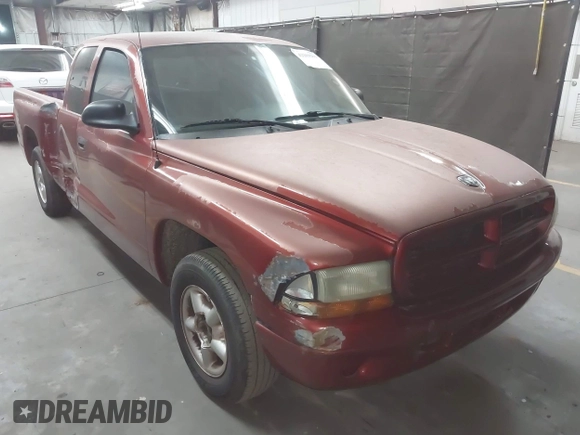 1999 Dodge Dakota SLT z VIN 1B7GL22XXXS240005, wystawiony jako IAAI lot #42269211 z przebiegiem 218 163 mil mil oraz . Historia ofert i sprzedaży dostępna na DreamBid. Obrazek 1.