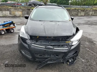 2013 Ford Escape SE с VIN 1FMCU9G95DUC05995, выставлен на аукционе Copart как лот 56650245 с пробегом 130 201 миль миль и Списание • Salvage title. История ставок и продаж доступна на DreamBid. Изображение 5.