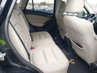 2015 Mazda CX-5 Touring with VIN JM3KE4CY2F0445178, listed as a IAAI auction lot 41828953 with 137,330 mi miles and . Bid and sale history available at DreamBid. Image 8.