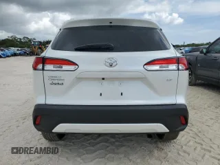 2024 Toyota Corolla Cross LE z VIN 7MUBAAAG9RV110858, wystawiony jako Copart lot #54520675 z przebiegiem 5 727 mil mil oraz Szkoda całkowita • Salvage title. Historia ofert i sprzedaży dostępna na DreamBid. Obrazek 6.