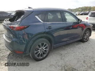 2021 Mazda CX-5 Signature with VIN JM3KFBEY3M0439658, listed as a Copart auction lot 74534464 with 50,816 mi miles and Salvage Title. Bid and sale history available at carsss.com. Image 3.