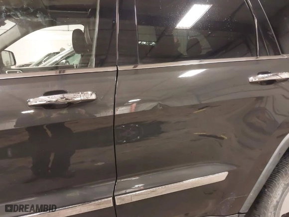 2011 Jeep Grand Cherokee Limited with VIN 1J4RR5GG3BC651065, listed as a IAAI auction lot 41020593 with 154,825 mi miles. Bid and sale history available at carsss.com. Image 19.