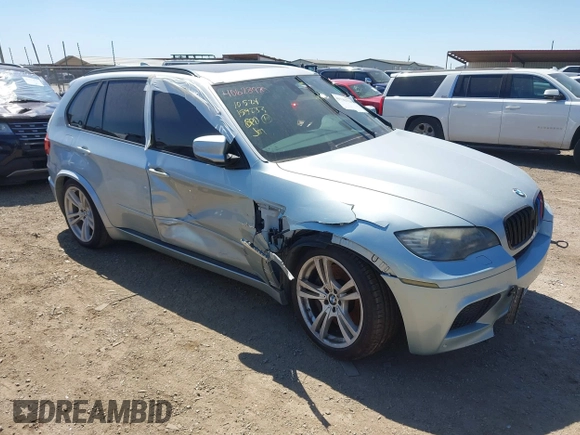 2011 BMW X5 M with VIN 5YMGY0C53BLK26167, listed as a IAAI auction lot 41742529 with 118,777 mi miles. Bid and sale history available at carsss.com. Image 1.