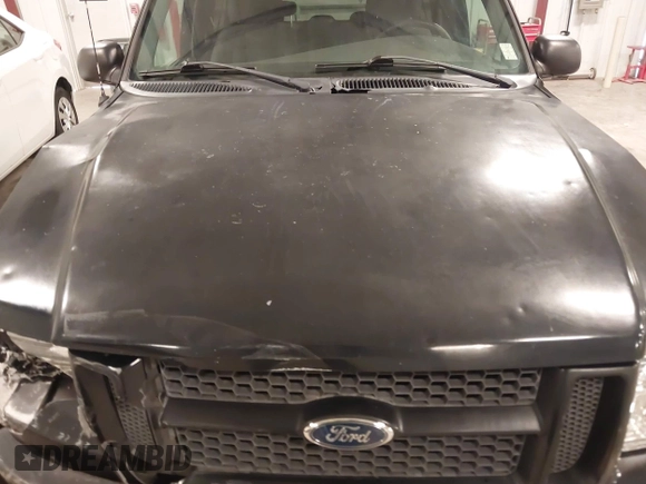 2001 Ford Explorer Sport z VIN 1FMYU60E71UA76200, wystawiony jako IAAI lot #41358321 z przebiegiem 118 134 mil mil oraz . Historia ofert i sprzedaży dostępna na DreamBid. Obrazek 12.