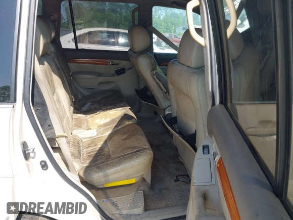 2003 Lexus GX 470 with VIN JTJBT20X630019033, listed as a IAAI auction lot 42128698 with 286,811 mi miles and . Bid and sale history available at DreamBid. Image 8.
