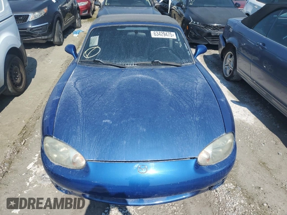 1999 Mazda MX-5 Miata with VIN JM1NB353XX0134898, listed as a Copart auction lot 63429475 with 140,595 mi miles and Clean title. Bid and sale history available at DreamBid. Image 5.