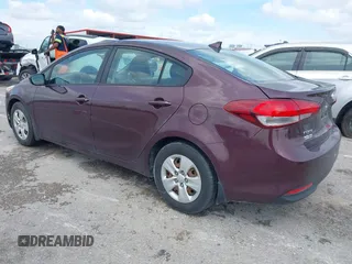 2018 Kia Forte LX with VIN 3KPFK4A70JE165286, listed as a IAAI auction lot 42128779 with 124,348 mi miles. Bid and sale history available at carsss.com. Image 3.