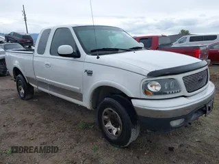 2000 Ford F-150 XL z VIN 2FTPX18L3YCA63600, wystawiony jako IAAI lot #42317241 z przebiegiem Nie podano mil oraz . Historia ofert i sprzedaży dostępna na DreamBid. Obrazek 1.