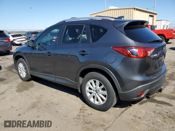 2014 Mazda CX-5 Touring with VIN JM3KE2CY7E0366690, listed as a Copart auction lot 50783635 with 127,853 mi miles and Salvage Title. Bid and sale history available at carsss.com. Image 2.