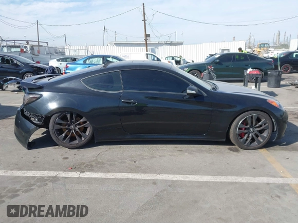 2012 Hyundai Genesis Coupe Grand Touring with VIN KMHHU6KH8CU068486, listed as a IAAI auction lot 41686499 with 104,579 mi miles and . Bid and sale history available at DreamBid. Image 13.
