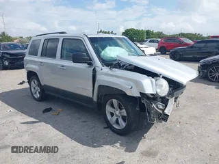 2013 Jeep Patriot Latitude with VIN 1C4NJPFA1DD260398, listed as a IAAI auction lot 41726749 with 146,609 mi miles. Bid and sale history available at carsss.com. Image 1.