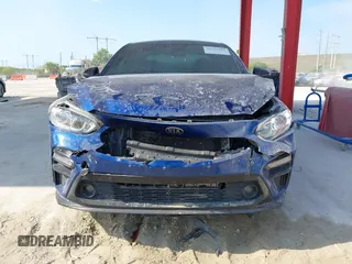 2021 Kia Forte GT-Line z VIN 3KPF34AD2ME386931, wystawiony jako IAAI lot #42333561 z przebiegiem 83 689 mil mil oraz . Historia ofert i sprzedaży dostępna na DreamBid. Obrazek 12.