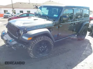 2024 Jeep Wrangler Willys z VIN 1C4RJXN61RW322456, wystawiony jako IAAI lot #41747226 z przebiegiem 2 043 mil mil oraz . Historia ofert i sprzedaży dostępna na DreamBid. Obrazek 17.