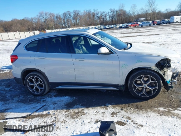 2018 BMW X1 xDrive28i z VIN WBXHT3C36J5L30217, wystawiony jako IAAI lot #41237775 z przebiegiem 60 071 mil mil oraz . Historia ofert i sprzedaży dostępna na DreamBid. Obrazek 13.