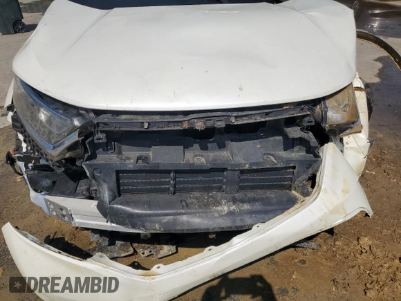 2017 Honda CR-V LX z VIN 2HKRW5H37HH403599, wystawiony jako Copart lot #52382055 z przebiegiem 112 674 mil mil oraz Szkoda całkowita • Salvage title. Historia ofert i sprzedaży dostępna na DreamBid. Obrazek 11.