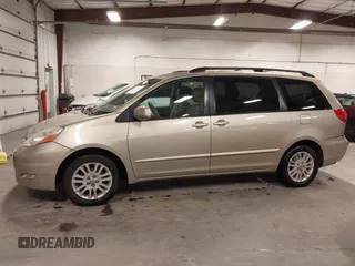 2009 Toyota Sienna XLE with VIN 5TDZK22CX9S236850, listed as a IAAI auction lot 42303935 with 201,583 mi miles and . Bid and sale history available at DreamBid. Image 14.