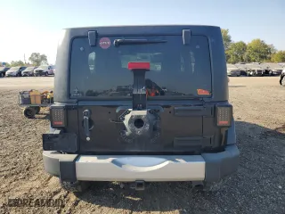 2011 Jeep Wrangler Unlimited Sahara with VIN 1J4BA5H10BL634002, listed as a Copart auction lot 75035234 with 139,182 mi miles and Salvage Title. Bid and sale history available at carsss.com. Image 6.