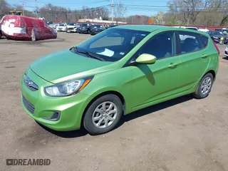 2014 Hyundai Accent GS with VIN KMHCT5AE0EU193502, listed as a IAAI auction lot 42036656 with 114,136 mi miles. Bid and sale history available at carsss.com. Image 2.