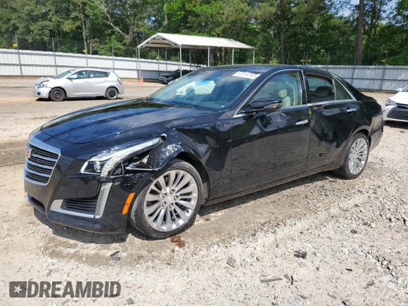 2016 Cadillac CTS Luxury Collection RWD z VIN 1G6AR5SX5G0106572, wystawiony jako Copart lot #57314745 z przebiegiem 129 830 mil mil oraz Szkoda całkowita • Salvage title. Historia ofert i sprzedaży dostępna na DreamBid. Obrazek 1.