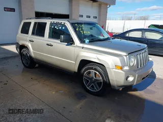 2009 Jeep Patriot Sport with VIN 1J4FT28B59D195435, listed as a IAAI auction lot 40758450 with 130,728 mi miles. Bid and sale history available at carsss.com. Image 1.