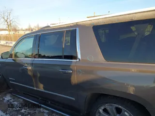2016 GMC Yukon XL Denali with VIN 1GKS2HKJ8GR432174, listed as a IAAI auction lot 41411844 with 187,258 mi miles and . Bid and sale history available at carsss.com. Image 14.