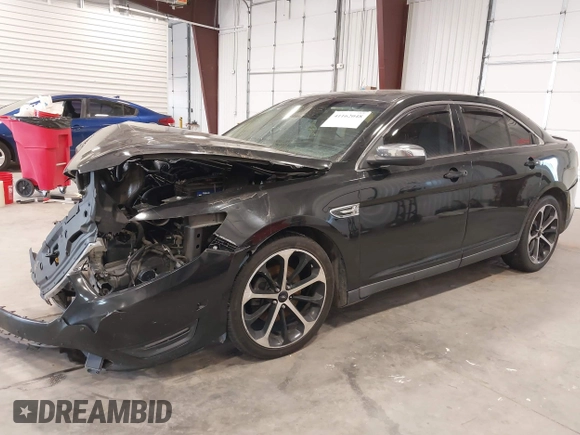 2014 Ford Taurus Limited с VIN 1FAHP2J84EG112559, выставлен на аукционе IAAI как лот 41162048 с пробегом 184 301 миль миль и . История ставок и продаж доступна на DreamBid. Изображение 2.