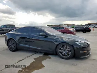 2022 Tesla Model S с VIN 5YJSA1E50NF492117, выставлен на аукционе Copart как лот 54307855 с пробегом 42 940 миль миль и Списание • Salvage title. История ставок и продаж доступна на DreamBid. Изображение 4.
