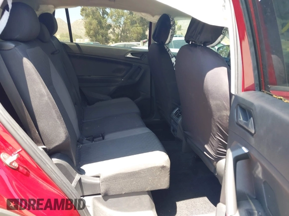 2018 Volkswagen Tiguan S with VIN 3VV1B7AX4JM043324, listed as a IAAI auction lot 42623550 with 62,858 mi miles and . Bid and sale history available at DreamBid. Image 8.