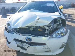 2014 Toyota Prius One with VIN JTDKDTB38E1575308, listed as a IAAI auction lot 40787857 with 70,891 mi miles and . Bid and sale history available at DreamBid. Image 6.