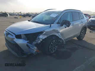 2023 Toyota Corolla Cross Hybrid S with VIN 7MUFBABG8PV011345, listed as a IAAI auction lot 41286619 with 13,518 mi miles and . Bid and sale history available at DreamBid. Image 2.