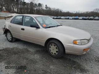 1996 Toyota Camry DX with VIN 4T1BG12K2TU662504, listed as a Copart auction lot 46255245 with 268,817 mi miles and Salvage Title. Bid and sale history available at carsss.com. Image 4.