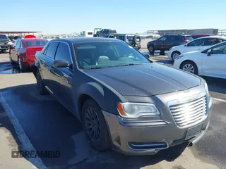 2014 Chrysler 300 with VIN 2C3CCAAG1EH191375, listed as a IAAI auction lot 41867688 with 218,740 mi miles. Bid and sale history available at carsss.com. Image 1.