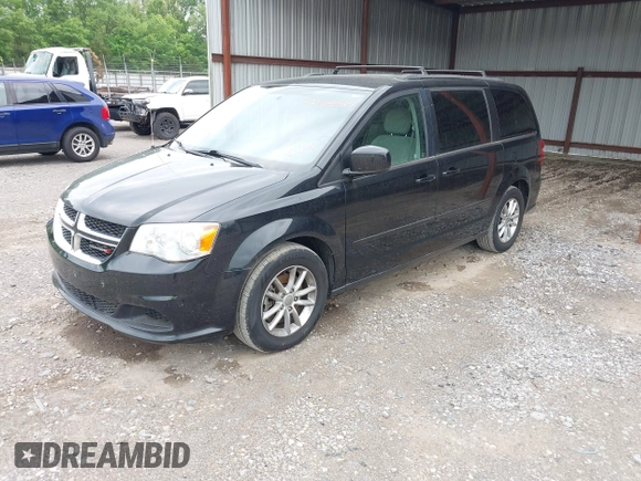 2013 Dodge Grand Caravan SXT with VIN 2C4RDGCG9DR599814, listed as a IAAI auction lot 42168424 with 173,413 mi miles and . Bid and sale history available at DreamBid. Image 2.