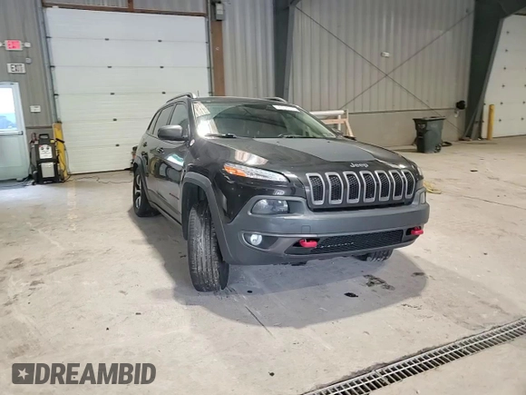 2016 Jeep Cherokee Trailhawk with VIN 1C4PJMBS4GW267375, listed as a Copart auction lot 58476005 with 116,151 mi miles and Salvage title. Bid and sale history available at DreamBid. Image 14.