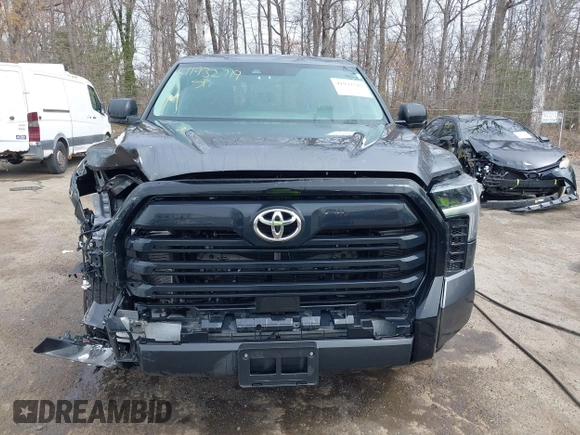 2023 Toyota Tundra with VIN 5TFKB5GDXPX002218, listed as a IAAI auction lot 41932719 with 71,335 mi miles and . Bid and sale history available at DreamBid. Image 12.