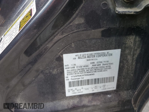 2007 Mazda 6 i Sport VE with VIN 1YVHP84C675M24095, listed as a Copart auction lot 80582564 with 196,394 mi miles and Salvage Title. Bid and sale history available at DreamBid. Image 14.