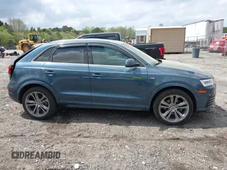 2018 Audi Q3 Premium Plus z VIN WA1JCCFS8JR014631, wystawiony jako IAAI lot #41958696 z przebiegiem 94 063 mil mil oraz . Historia ofert i sprzedaży dostępna na DreamBid. Obrazek 13.