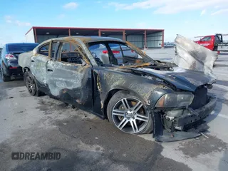 2014 Dodge Charger RT z VIN 2C3CDXCT4EH339299, wystawiony jako IAAI lot #41040937 z przebiegiem Nie podano mil oraz . Historia ofert i sprzedaży dostępna na DreamBid. Obrazek 1.
